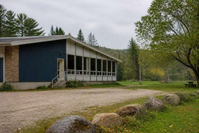 A mid-century community centre beside a quiet northern Ontario park